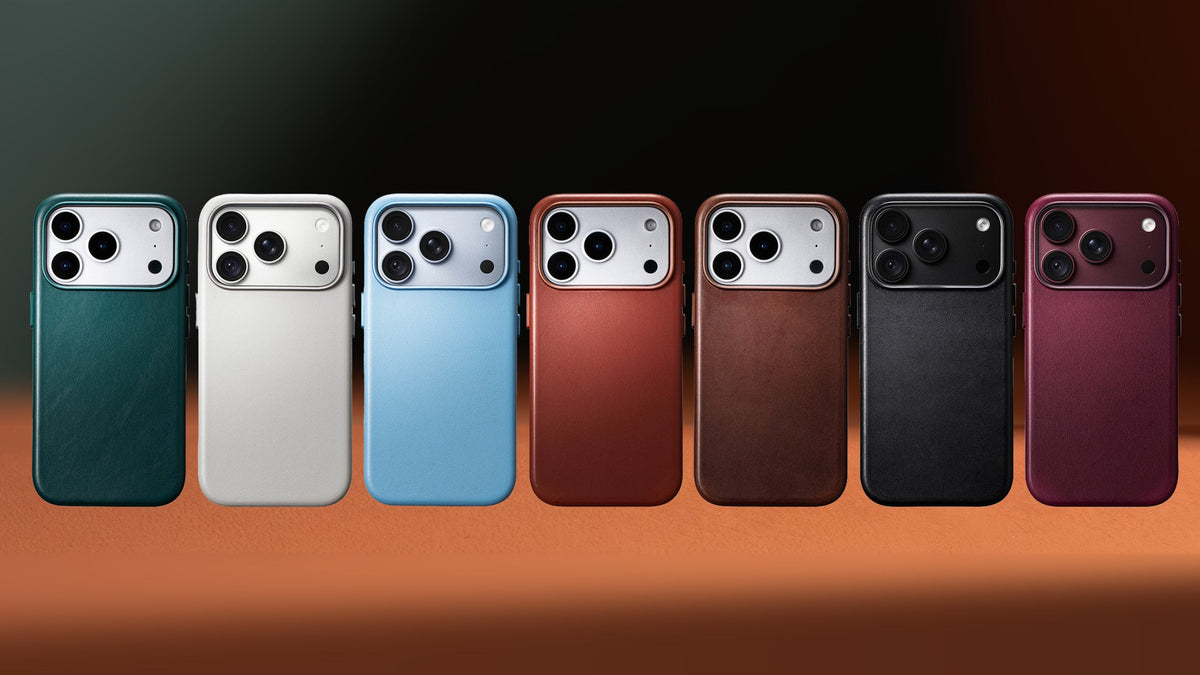 Casebellé iPhone 18 Pro Max leather cases in seven colours standing in a row on a wooden desk