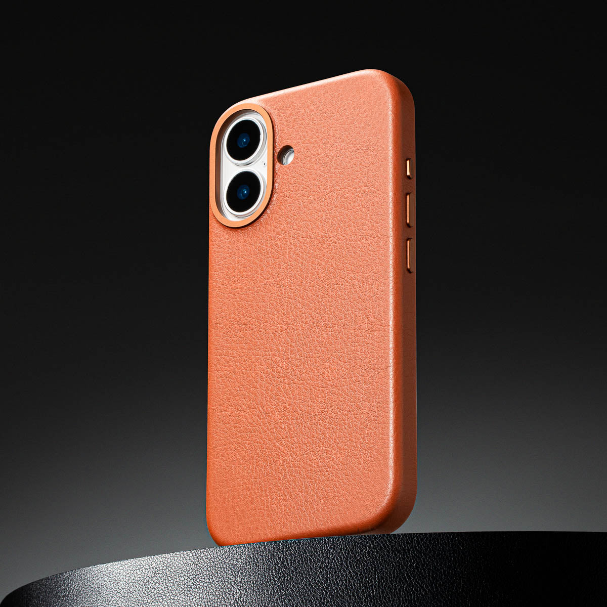 close up of cognac brown leather case for iphone 17 max showing full grain italian leather texture