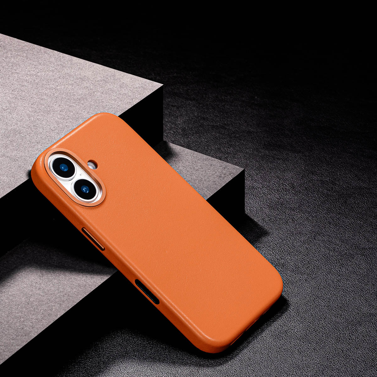 slim cognac brown iphone 17 leather case showing thin profile and curved edges