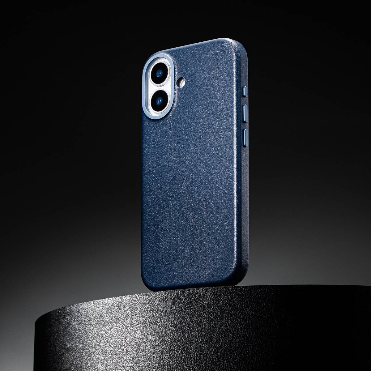 close up of steel blue leather case for iphone 17 showing full grain italian leather texture