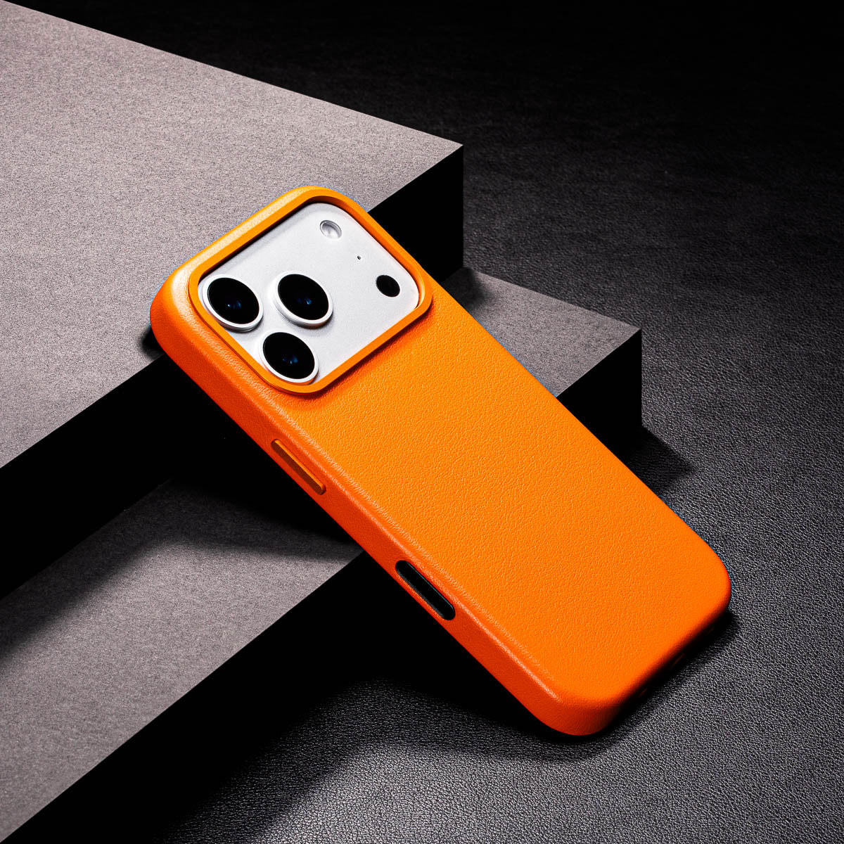 slim solar orange iphone 17 pro leather case showing thin profile and curved edges