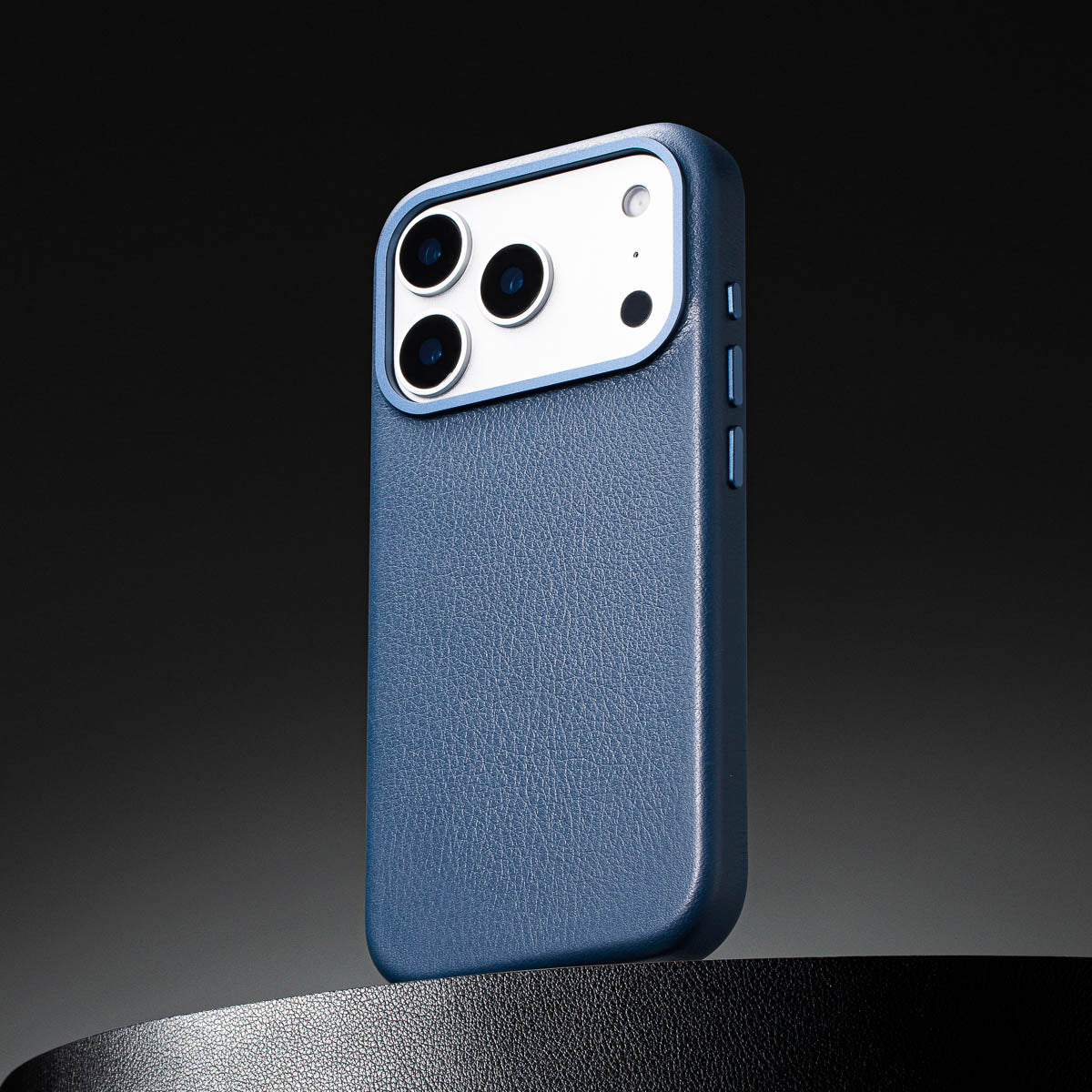 close up of steel blue leather case for iphone 17 pro showing full grain italian leather texture