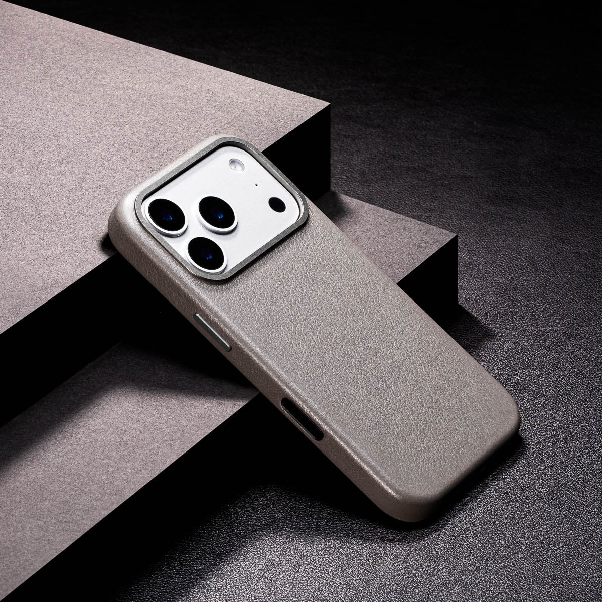 slim stone grey iphone 17 pro leather case showing thin profile and curved edges