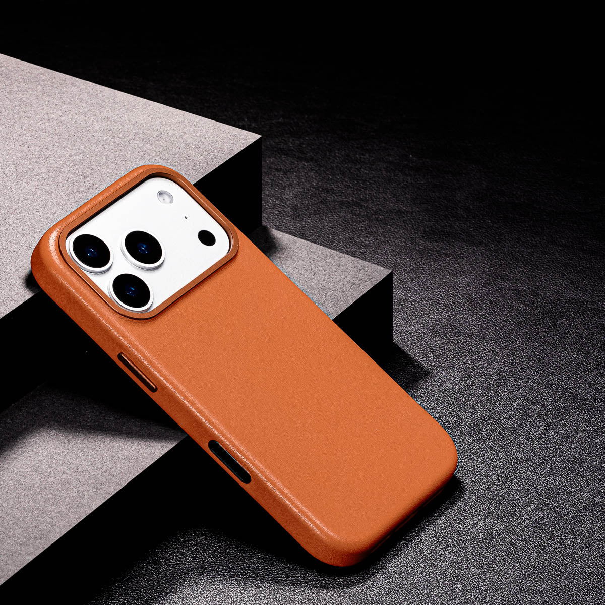 slim cognac brown iphone 17 pro max leather case showing thin profile and curved edges