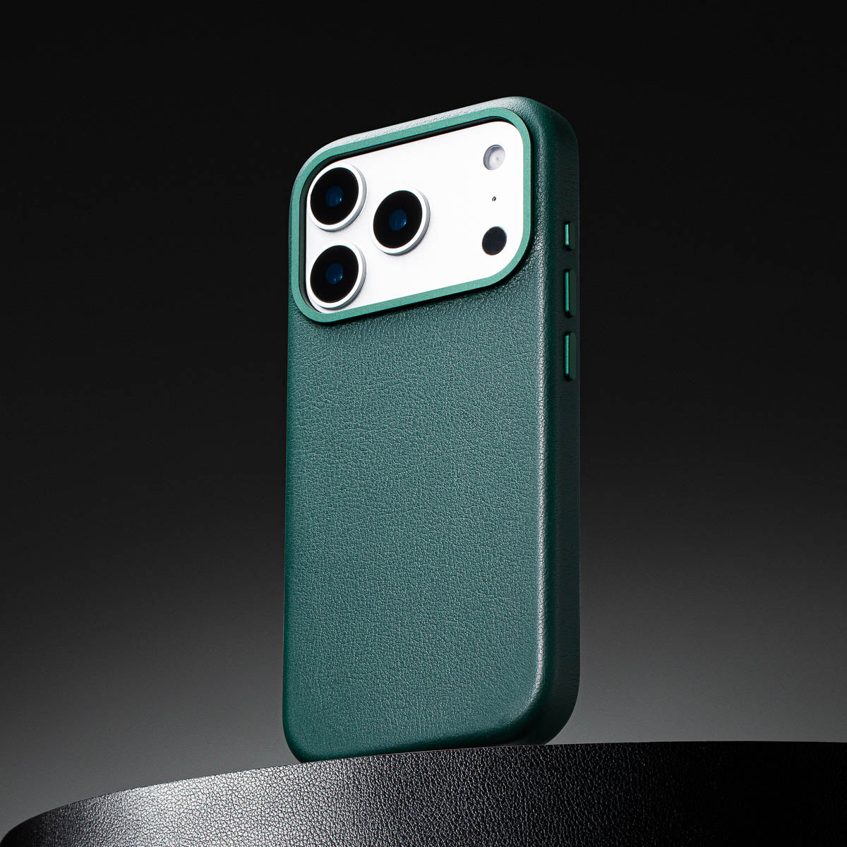 close up of racing green leather case for iphone 17 pro max showing full grain italian leather texture