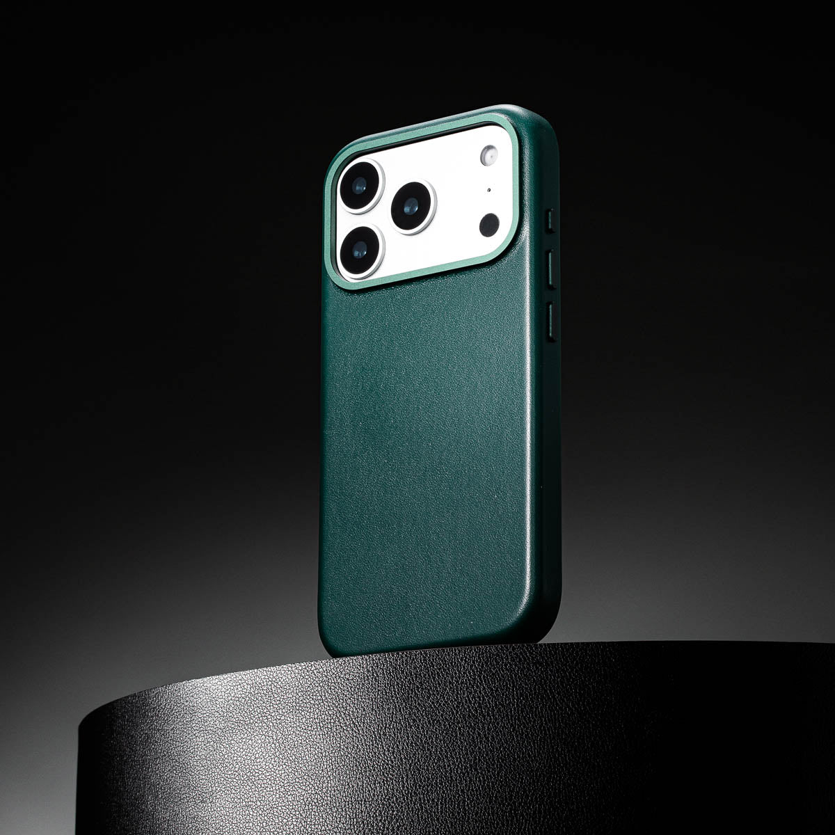 close up of racing green leather case for iphone 17 pro max showing full grain italian leather texture