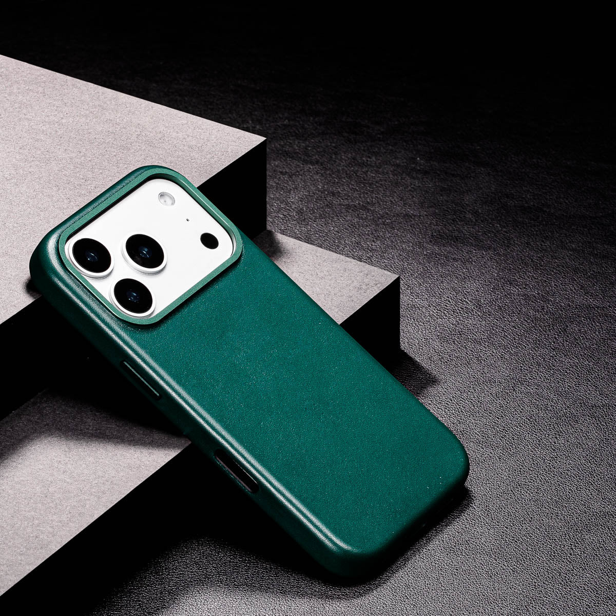 slim racing green iphone 17 pro max leather case showing thin profile and curved edges