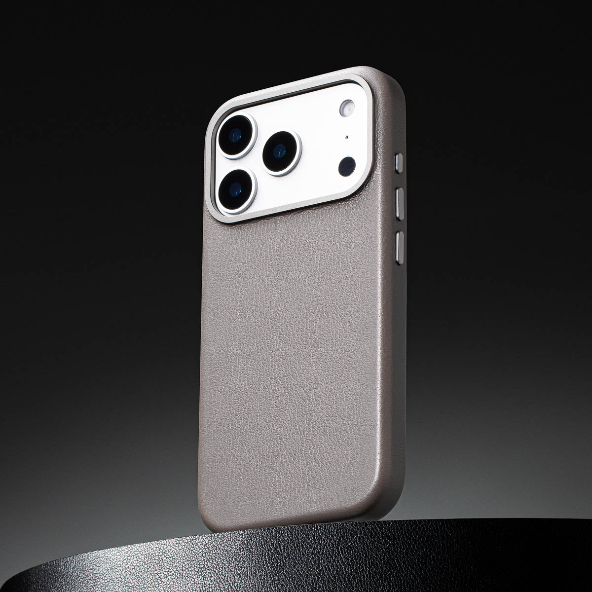 close up of stone grey leather case for iphone 17 pro max max showing full grain italian leather texture