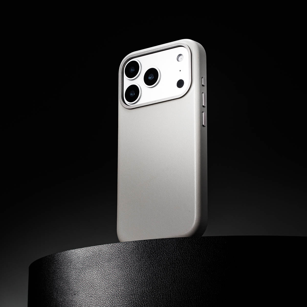 close up of stone grey leather case for iphone 17 pro max showing full grain italian leather texture