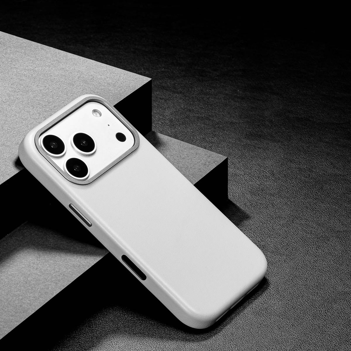 slim stone grey iphone 17 pro max leather case showing thin profile and curved edges