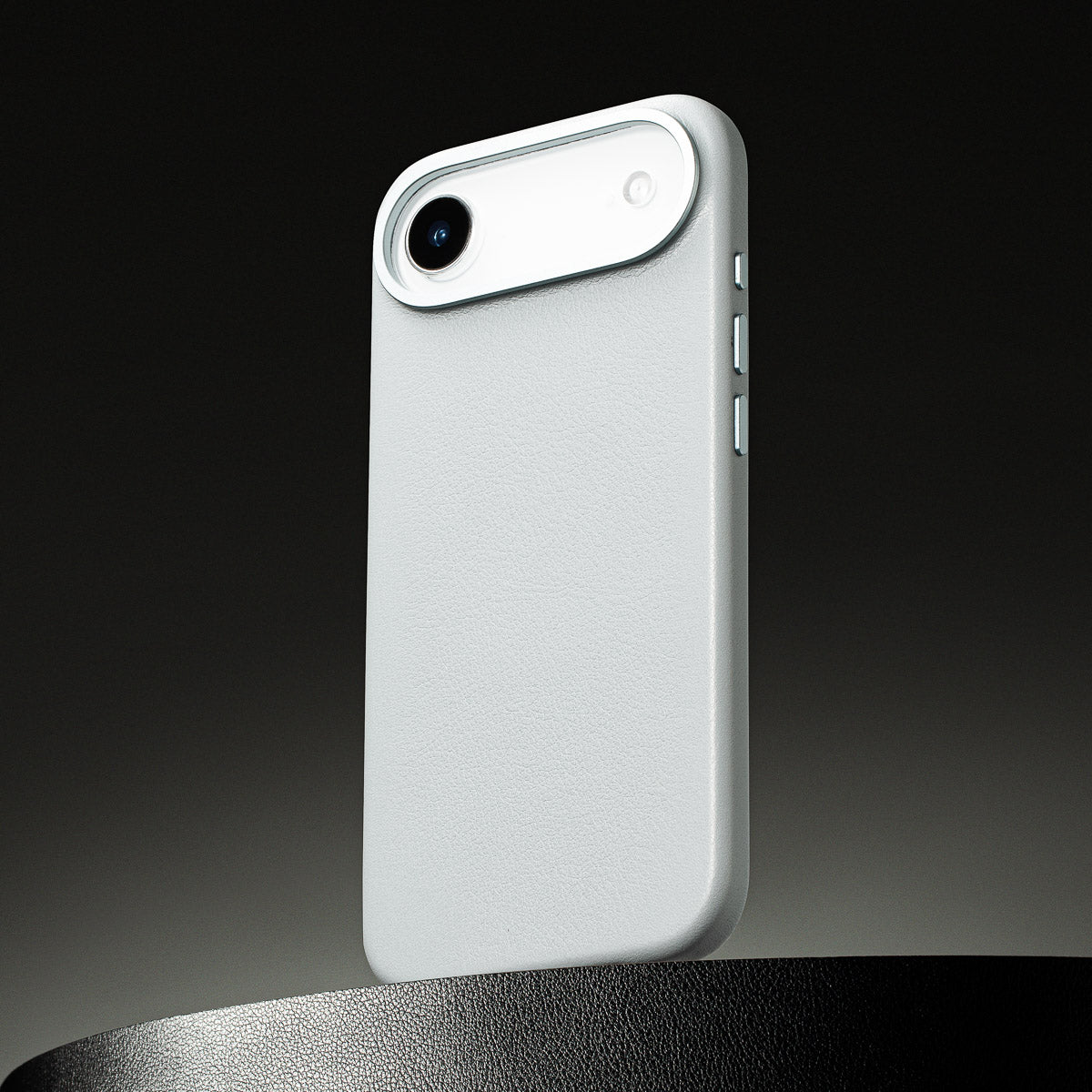 close up of pale blue leather case for iphone air showing full grain italian leather texture