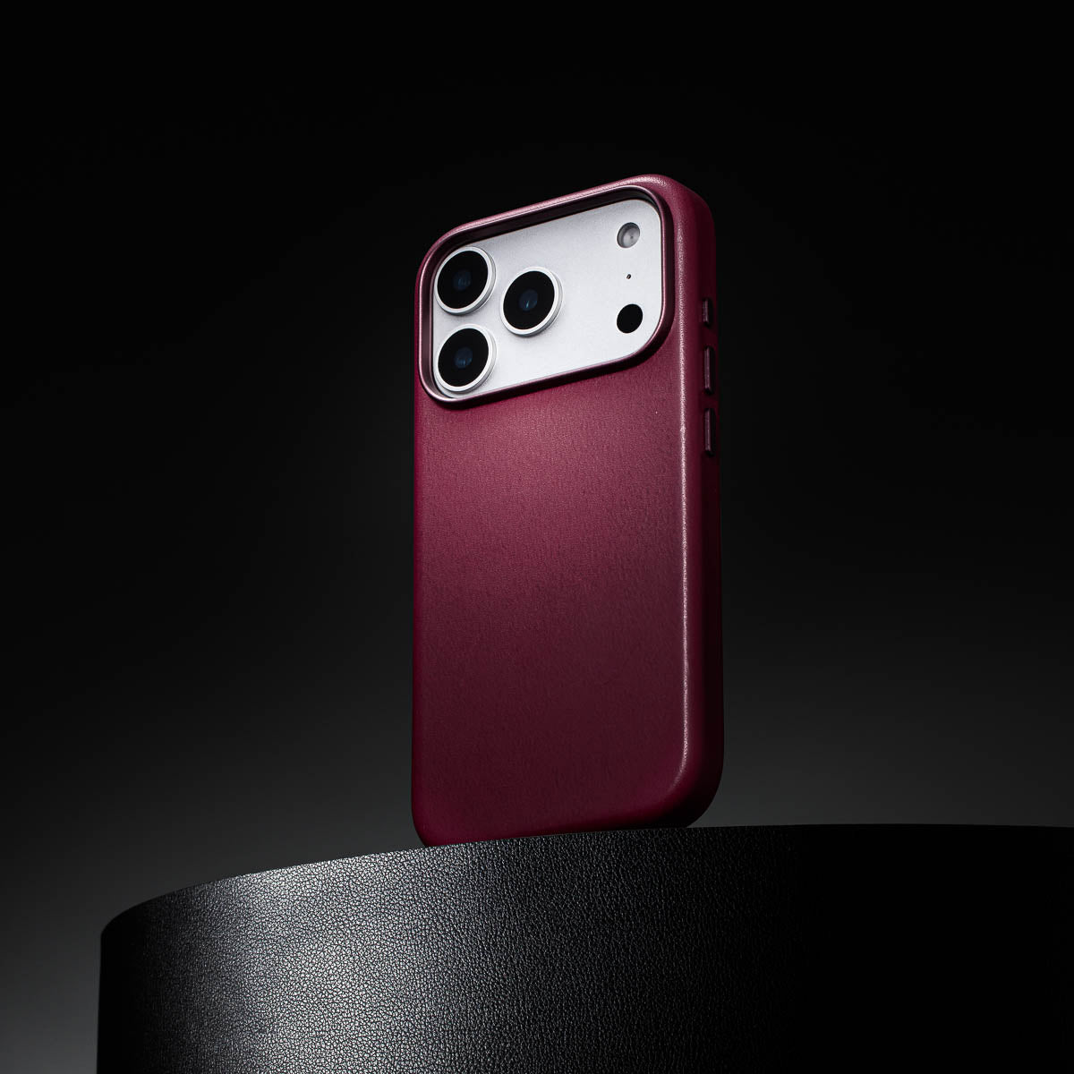 iphone 17 pro leather case in burgundy standing upright showing slim profile
