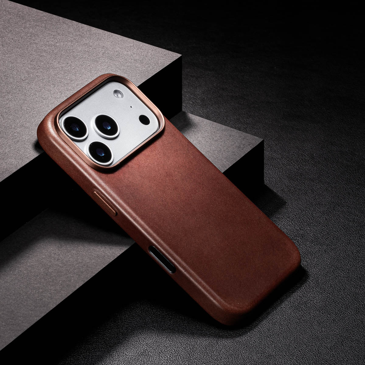 close up of dark brown iphone 18 pro leather case camera frame and full grain vachetta texture