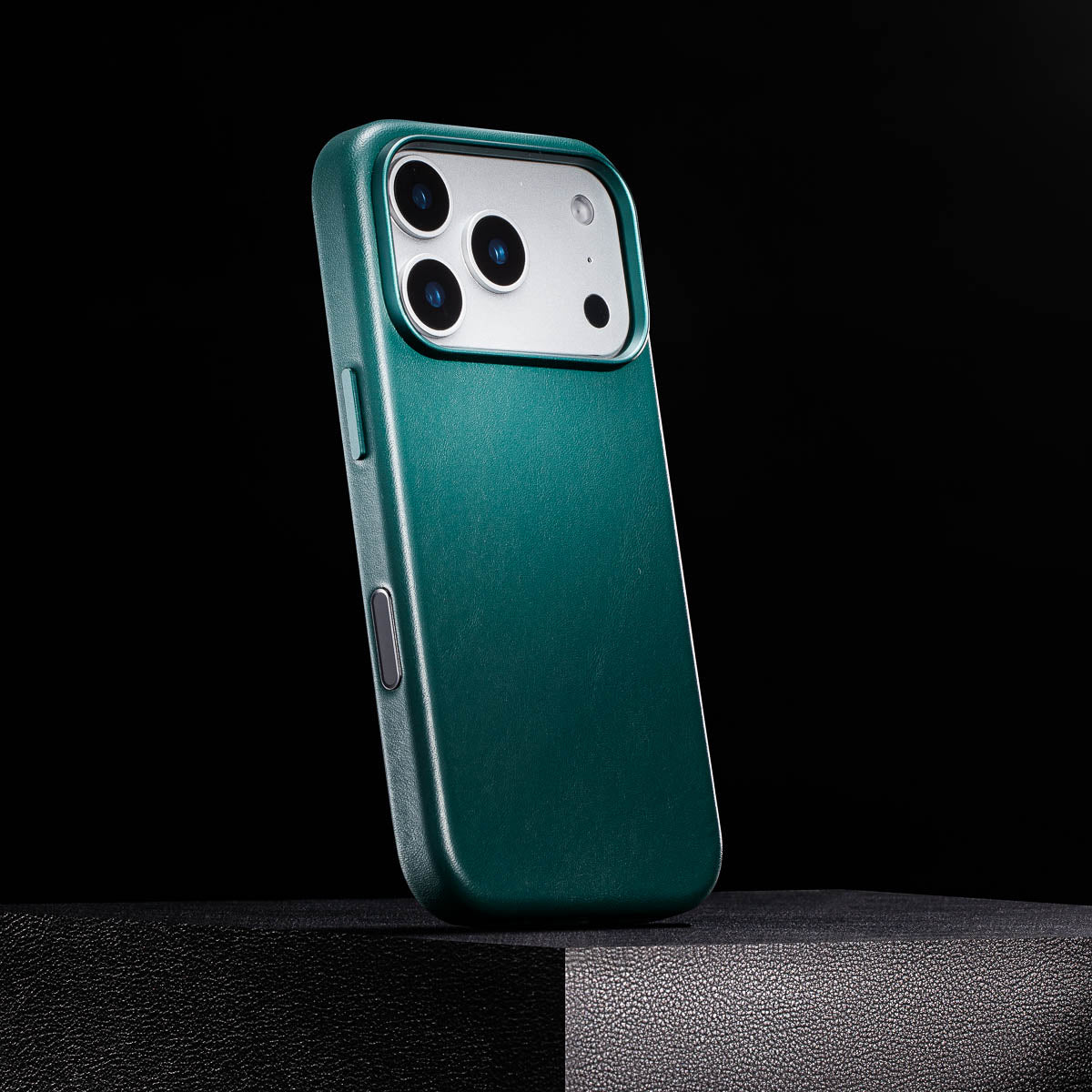 side view of racing green iphone 18 pro leather case with colour matched metal buttons and camera control button