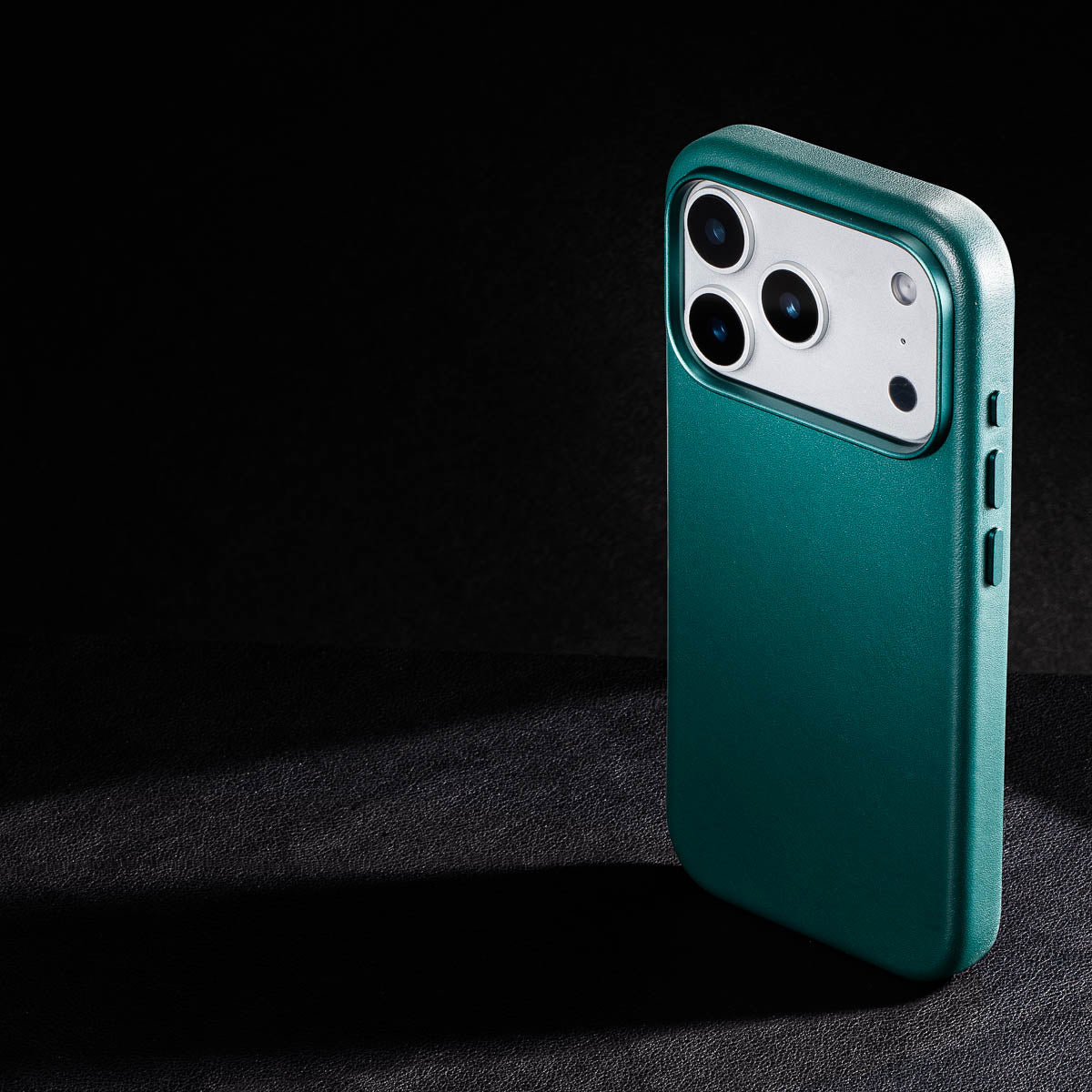 rear three-quarter view of racing green leather case for iphone 18 pro max showing raised camera ring