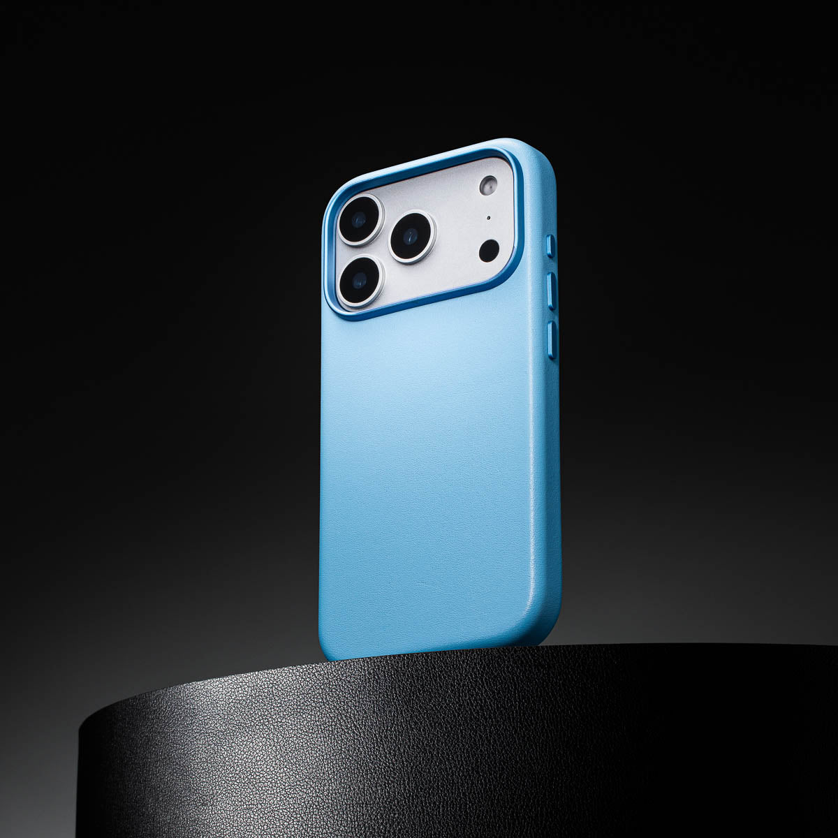 sky blue leather iphone 18 pro max case standing upright showing slim profile and curved edges