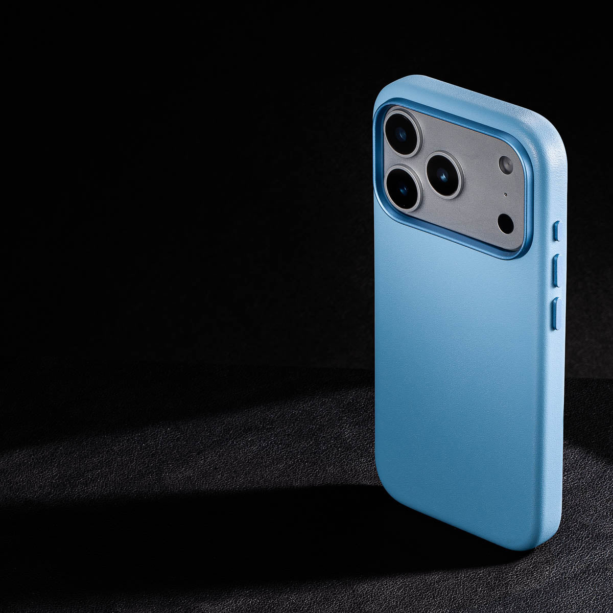 rear three-quarter view of sky blue leather case for iphone 18 pro max showing raised camera ring