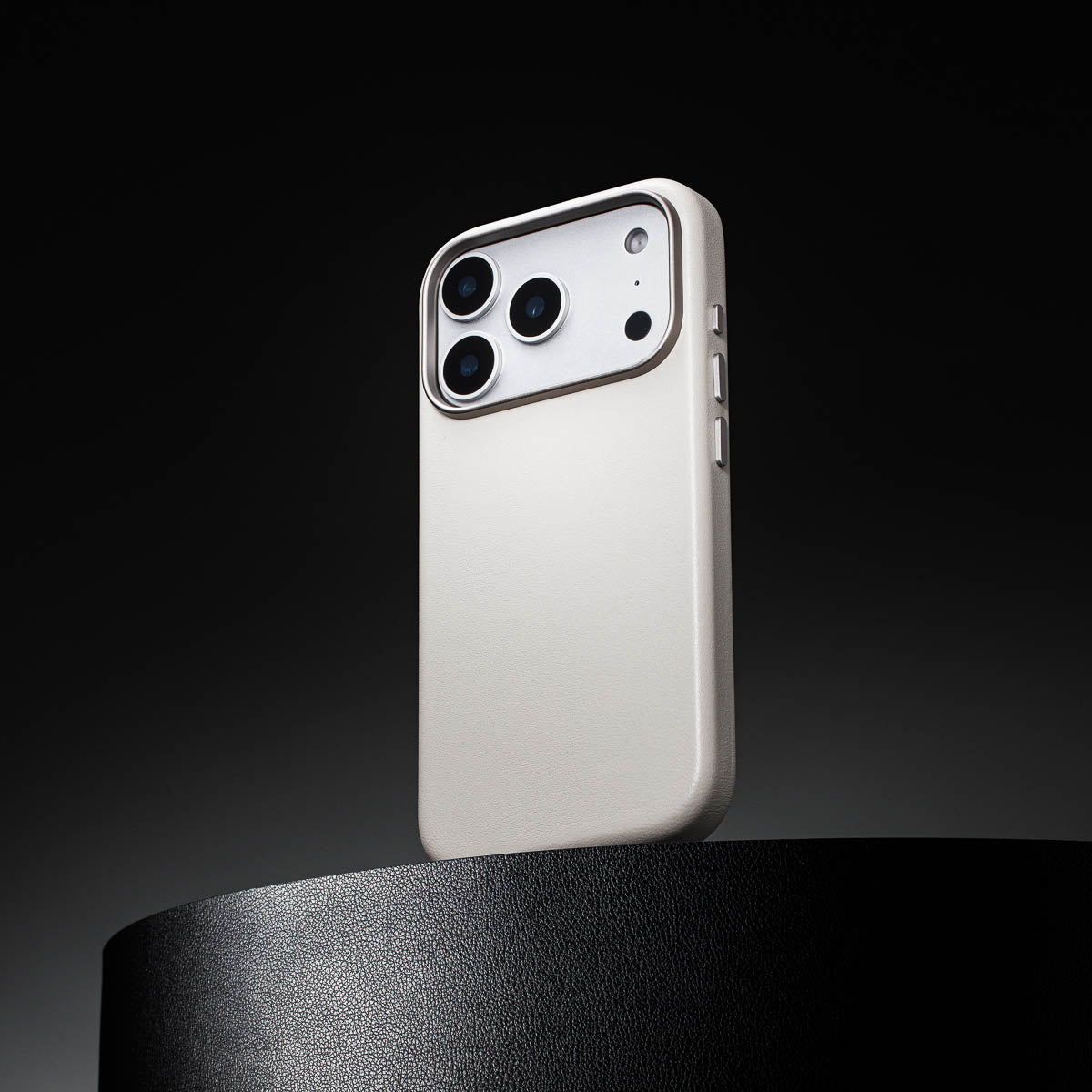 stone grey leather iphone 18 pro max case standing upright showing slim profile and curved edges