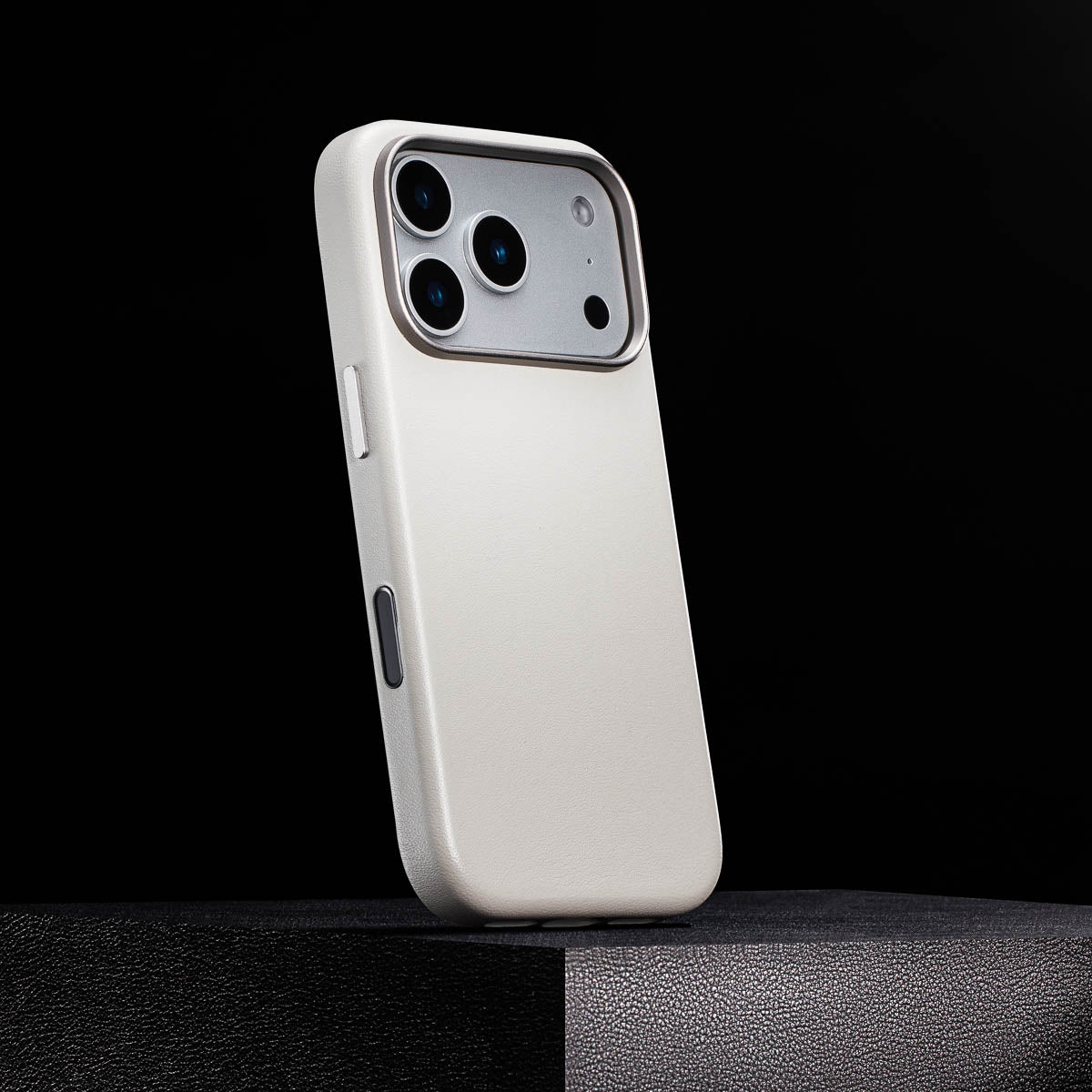 side view of stone grey iphone 18 pro max leather case with colour matched metal buttons and camera control button