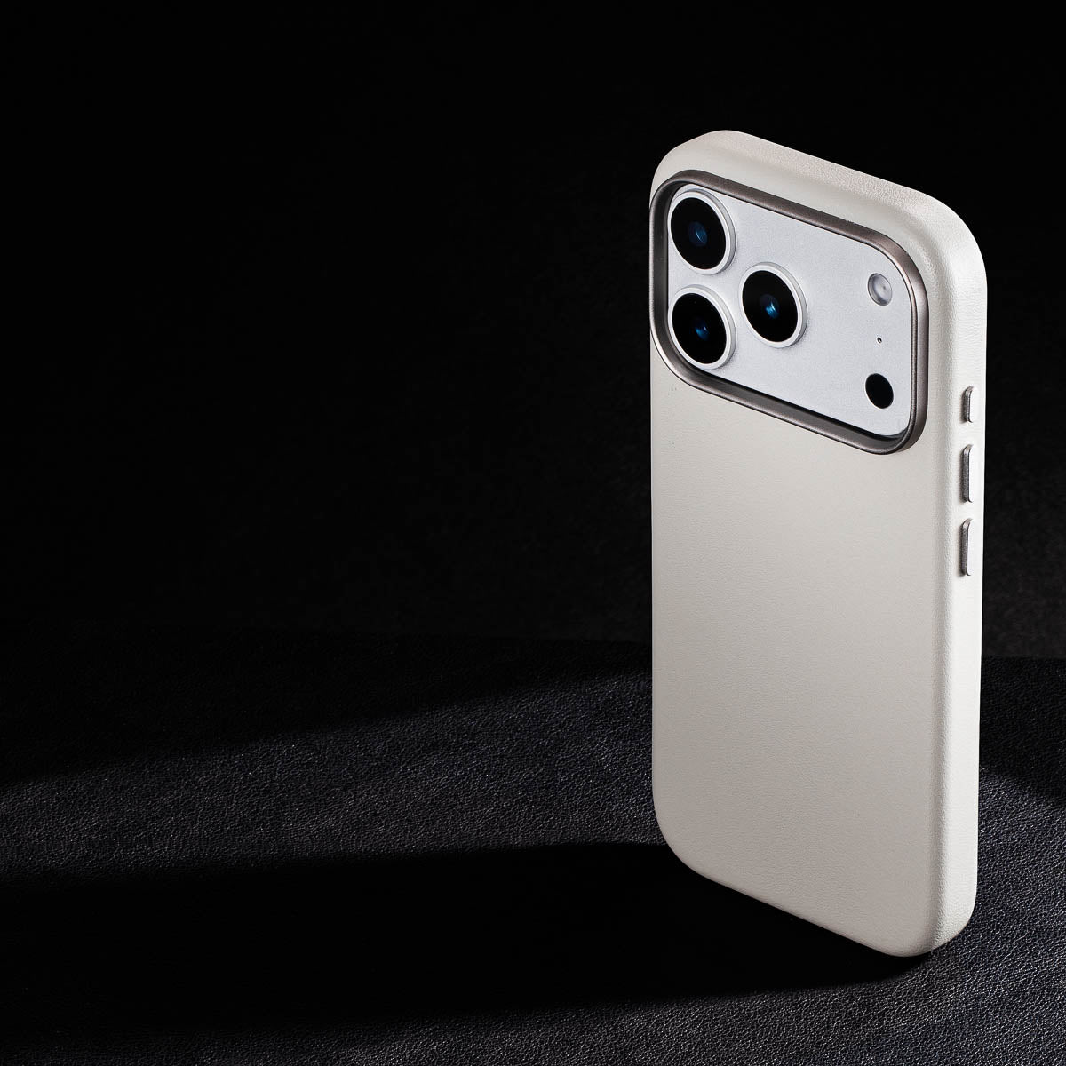 rear three-quarter view of stone grey leather case for iphone 18 pro max showing raised camera ring