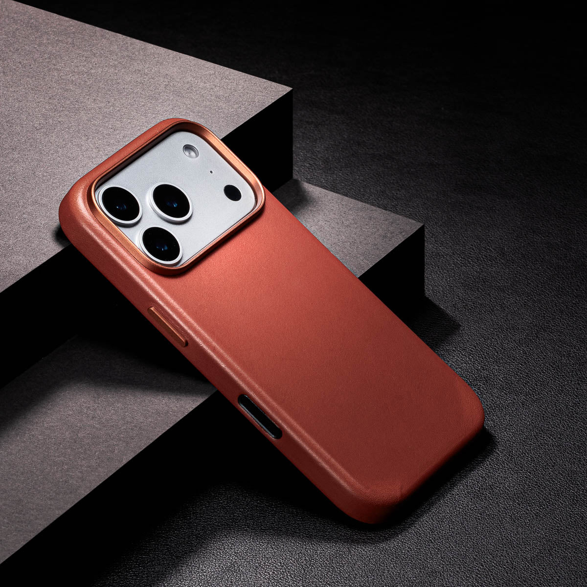 close up of umber iphone 18 pro max leather case camera frame and full grain vachetta texture