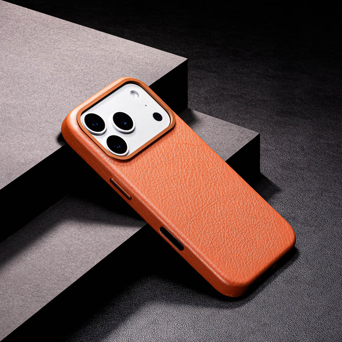 slim cognac brown iphone 17 pro max leather case showing thin profile and curved edges