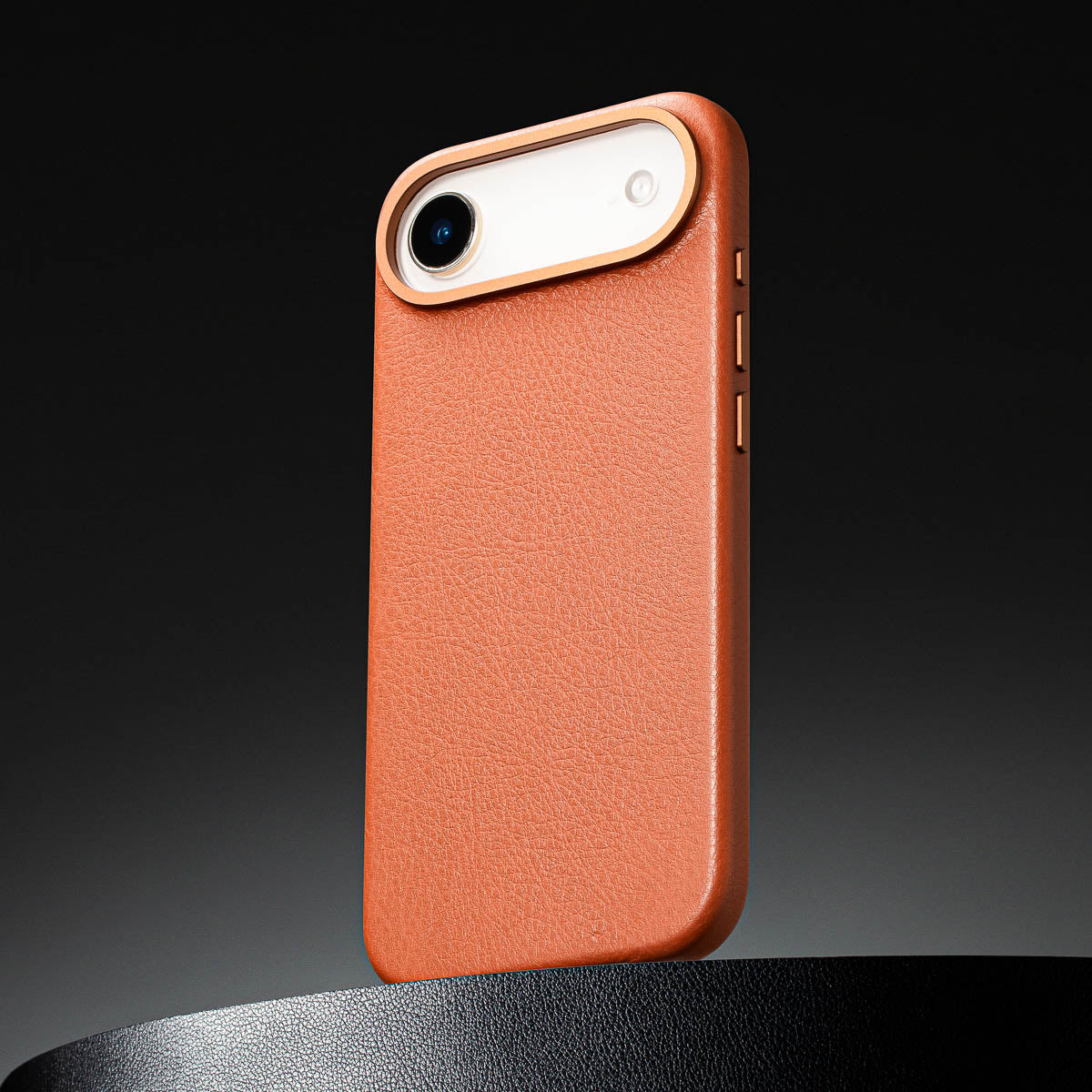 close up of cognac brown leather case for iphone air max showing full grain italian leather texture