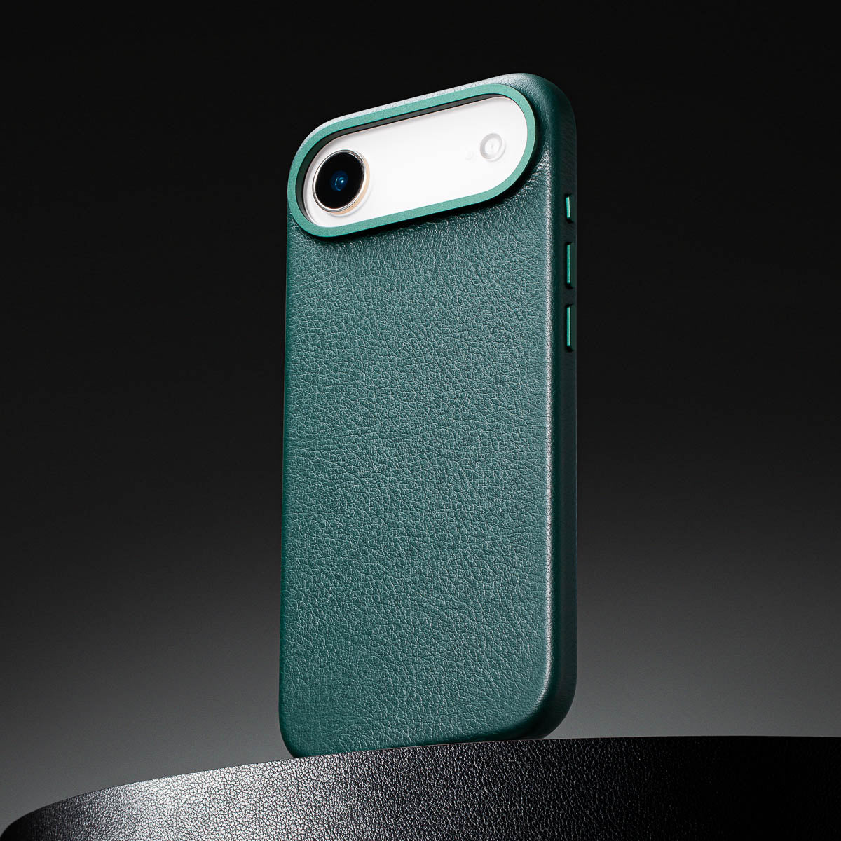 close up of racing green leather case for iphone air max showing full grain italian leather texture