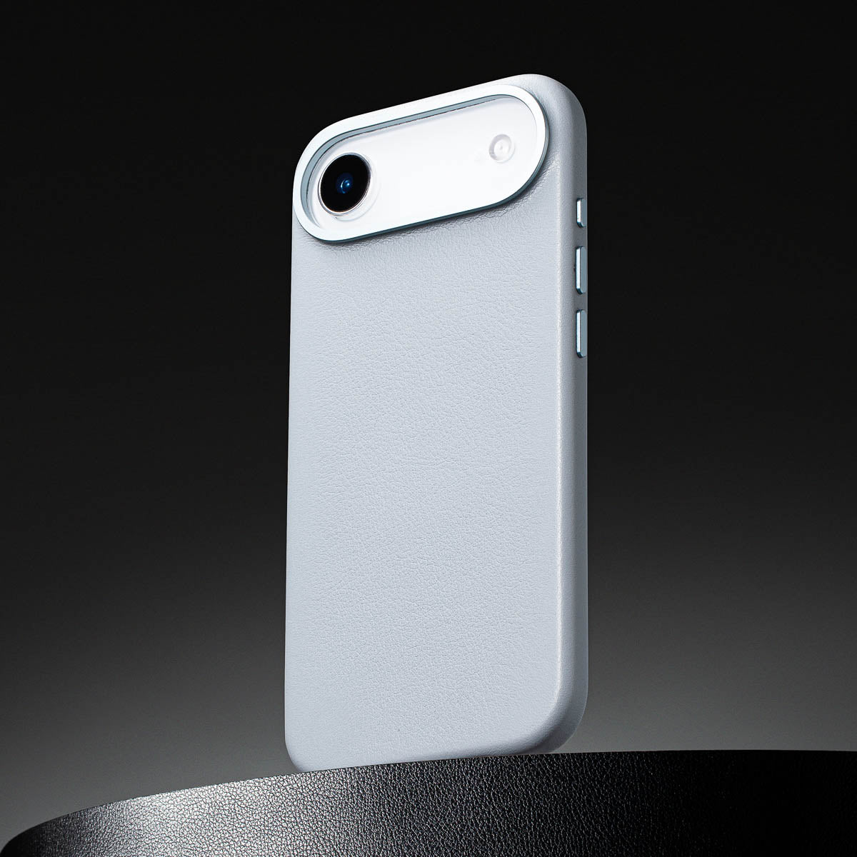 close up of sky blue leather case for iphone air max showing full grain italian leather texture