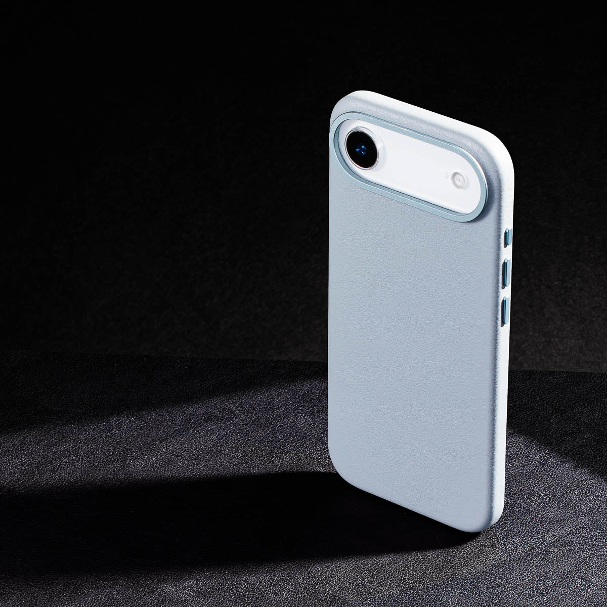 iphone air leather case in sky blue Ð raised camera ring and colour matched metal buttons detailing
